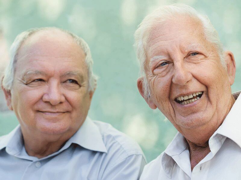 Smiling hopeful old men