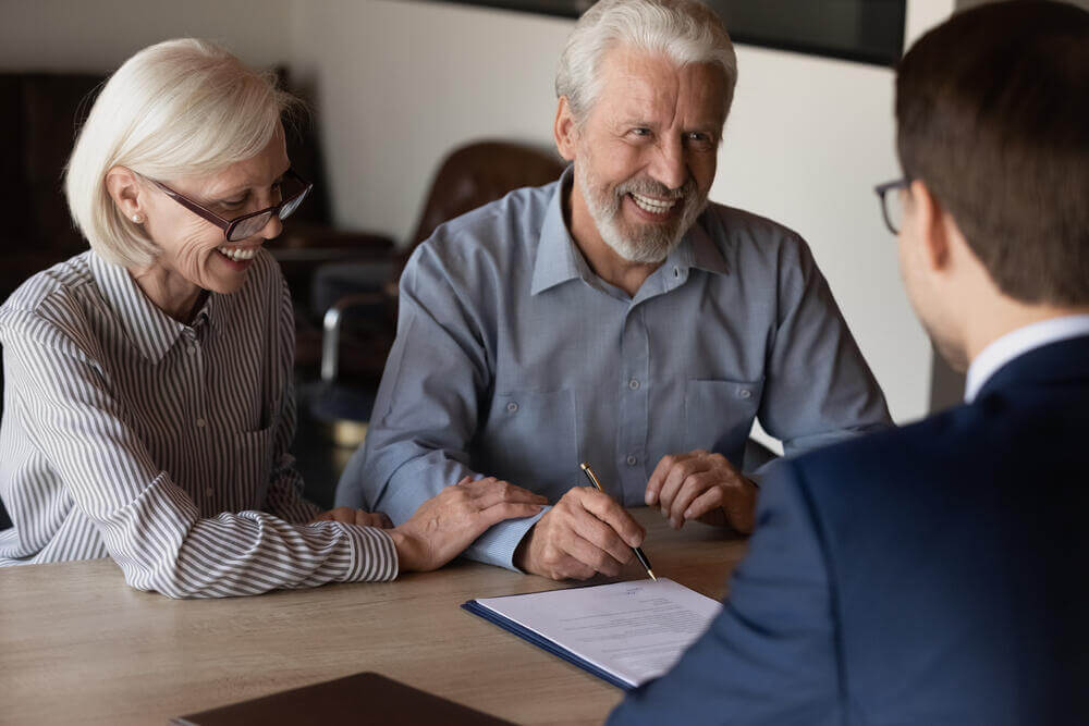 Smiling senior couple in California choosing the best trust for estate planning