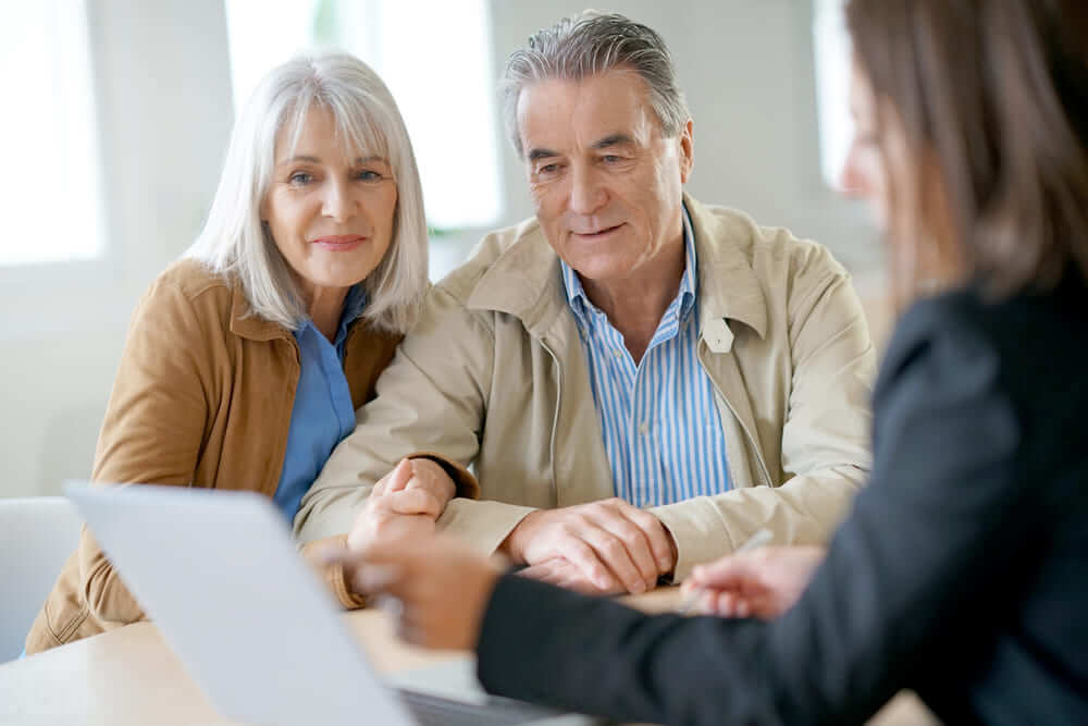 A senior couple doing estate planning
